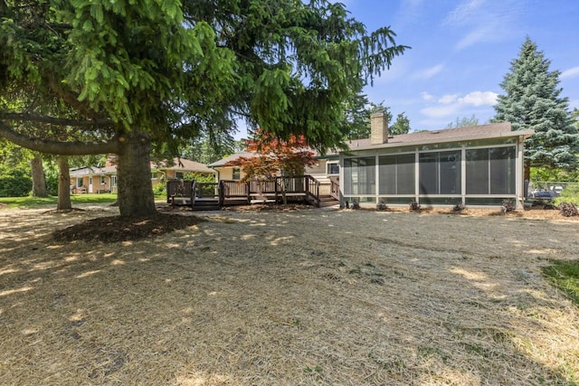 6101 W Edgerton Ave, Greendale, WI 53129 - view of yard featuring a sunroom and a deck
