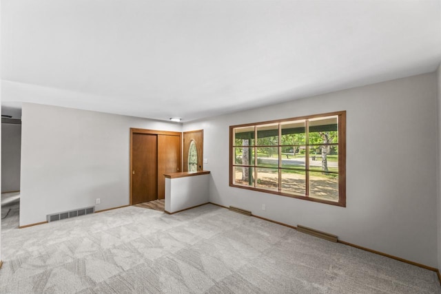 6101 W Edgerton Ave, Greendale, WI 53129 - unfurnished bedroom featuring light carpet and a closet