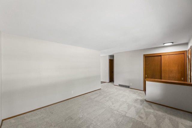 6101 W Edgerton Ave, Greendale, WI 53129 - empty room with light colored carpet and baseboards