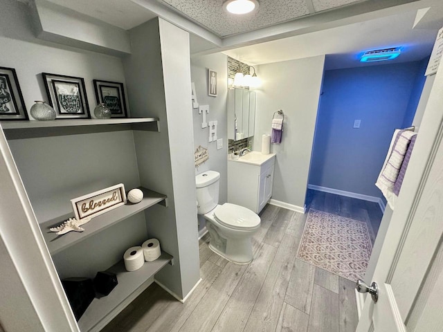 5510 W Luebbe Ln, Milwaukee, WI 53223 - bathroom featuring wood finished floors and vanity