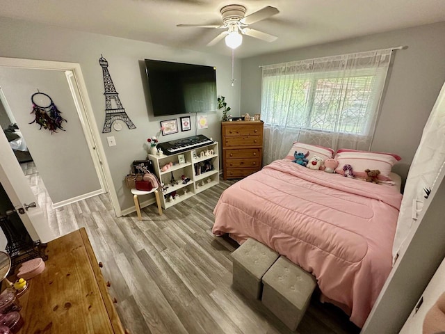 5510 W Luebbe Ln, Milwaukee, WI 53223 - bedroom with wood finished floors and a ceiling fan