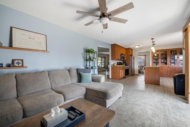 7939 32nd Ave, Kenosha, WI 53144 - living area featuring ceiling fan, light tile patterned flooring, and light colored carpet