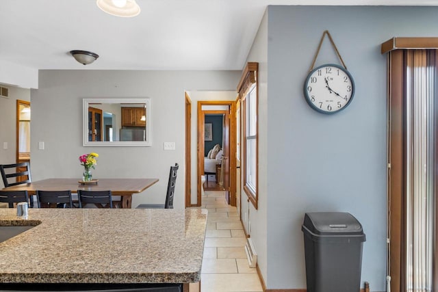7939 32nd Ave, Kenosha, WI 53144 - kitchen with light tile patterned floors and light countertops