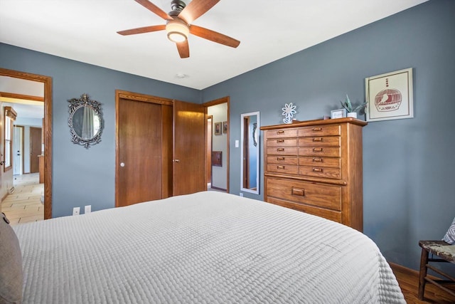 7939 32nd Ave, Kenosha, WI 53144 - bedroom featuring a closet, ceiling fan, and wood finished floors