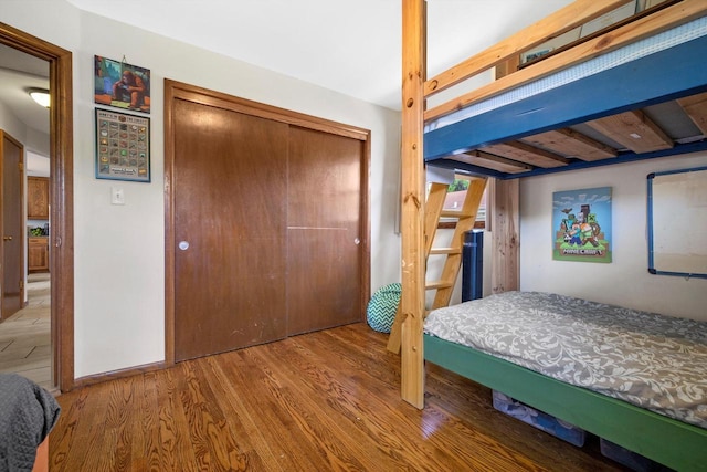 7939 32nd Ave, Kenosha, WI 53144 - bedroom featuring wood finished floors and a closet