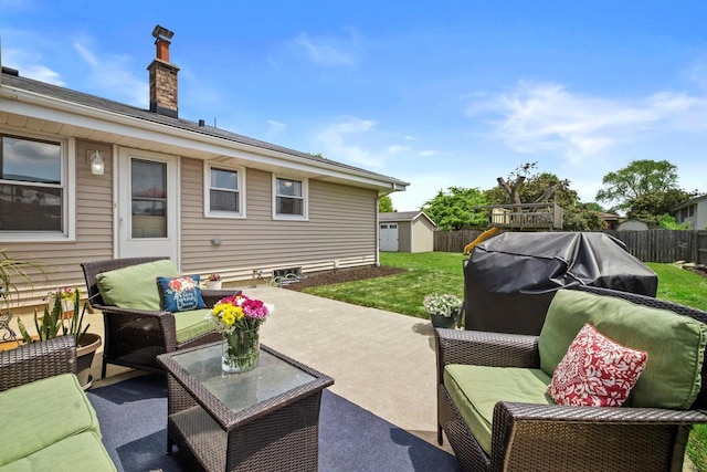 7939 32nd Ave, Kenosha, WI 53144 - view of patio / terrace featuring outdoor lounge area and a storage shed