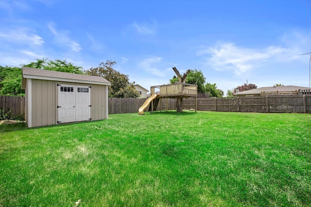 7939 32nd Ave, Kenosha, WI 53144 - fenced backyard with a playground and a storage shed