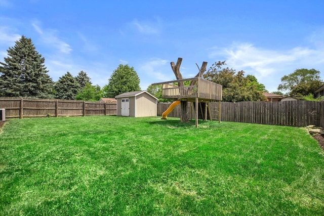 7939 32nd Ave, Kenosha, WI 53144 - fenced backyard with a storage unit and a wooden deck