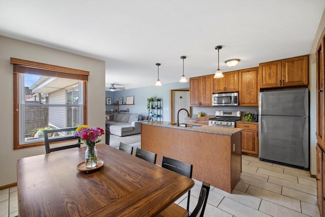 7939 32nd Ave, Kenosha, WI 53144 - dining room with light tile patterned flooring and ceiling fan