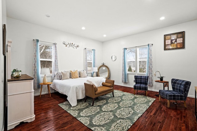 1100 W Fairy Chasm Rd, River Hills, WI 53217 - bedroom with multiple windows, dark wood-style flooring, and recessed lighting