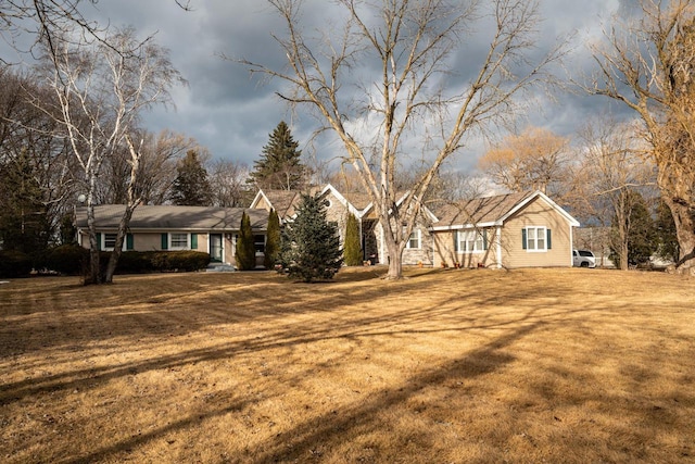 1100 W Fairy Chasm Rd, River Hills, WI 53217 - view of front of house featuring a front yard