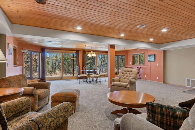 W11686 Buttercup Ave, Hancock, WI 54943 - carpeted living area with wood ceiling, recessed lighting, and a tray ceiling