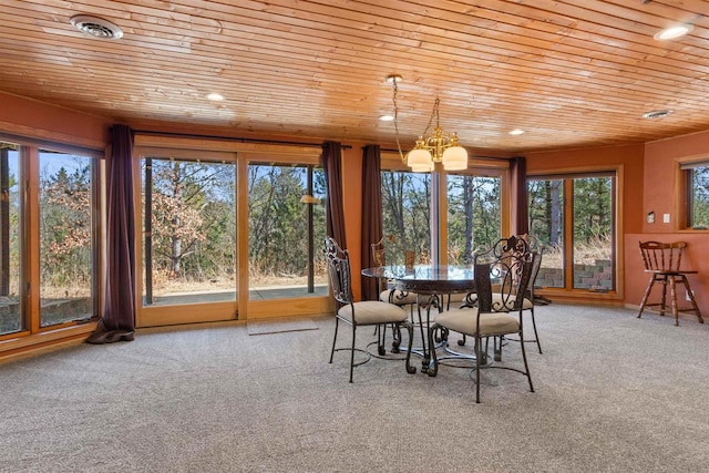 W11686 Buttercup Ave, Hancock, WI 54943 - dining room with wood ceiling, a chandelier, plenty of natural light, carpet, and recessed lighting