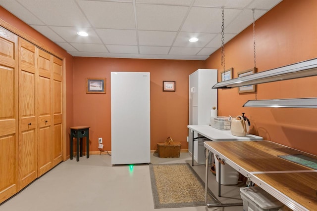 W11686 Buttercup Ave, Hancock, WI 54943 - kitchen featuring a drop ceiling, recessed lighting, and finished concrete flooring