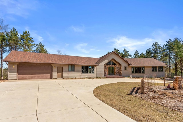 W11686 Buttercup Ave, Hancock, WI 54943 - single story home with driveway, an attached garage, and a shingled roof