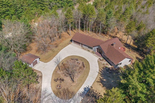 W11686 Buttercup Ave, Hancock, WI 54943 - aerial view of property and surrounding area featuring a heavily wooded area