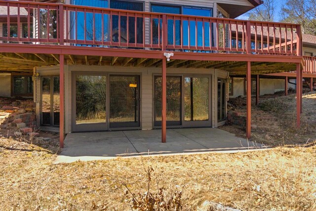 W11686 Buttercup Ave, Hancock, WI 54943 - back of house featuring a deck and a patio area