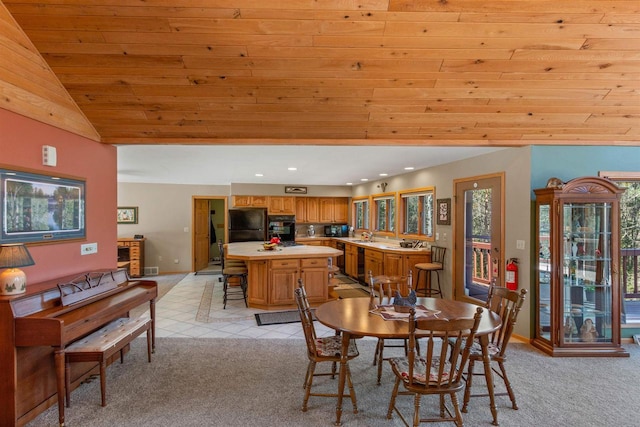W11686 Buttercup Ave, Hancock, WI 54943 - dining area featuring light colored carpet, lofted ceiling, wooden ceiling, and recessed lighting