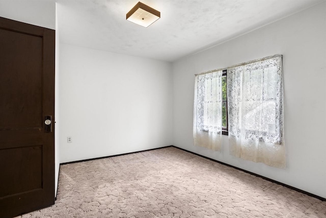 209 N Rankin St, Appleton, WI 54911 - carpeted empty room with baseboards