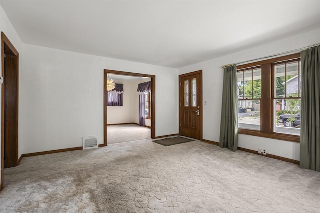 209 N Rankin St, Appleton, WI 54911 - entrance foyer with carpet and baseboards