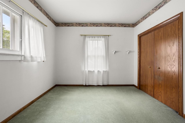 209 N Rankin St, Appleton, WI 54911 - unfurnished bedroom with carpet and a closet