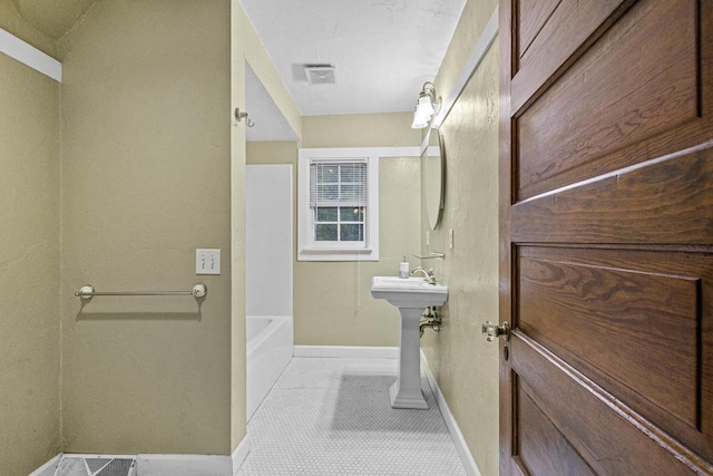 928 Emilie St, Green Bay, WI 54301 - bathroom with baseboards and a sink