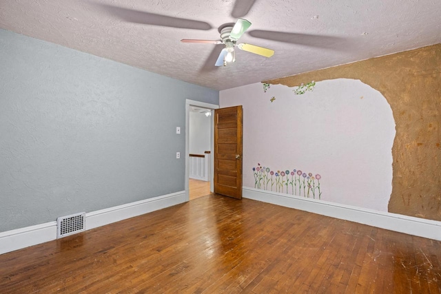 928 Emilie St, Green Bay, WI 54301 - empty room with wood-type flooring, ceiling fan, a textured ceiling, and a textured wall