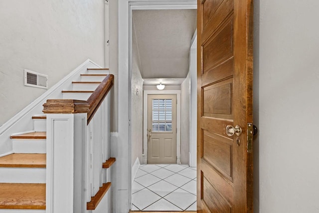 928 Emilie St, Green Bay, WI 54301 - entryway with stairway and light tile patterned floors