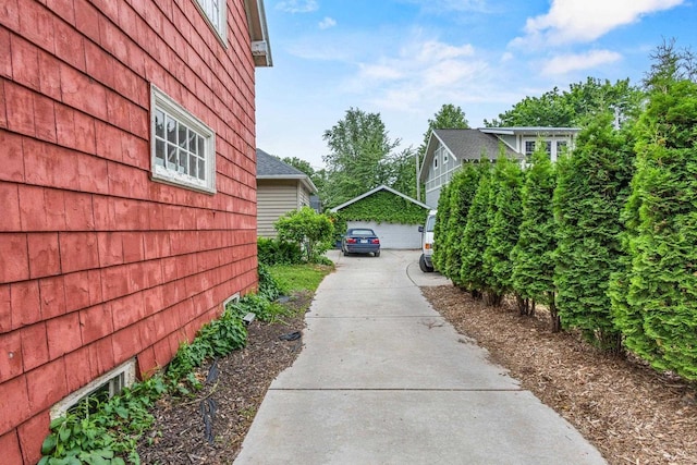 928 Emilie St, Green Bay, WI 54301 - view of home's exterior with a garage and an outdoor structure