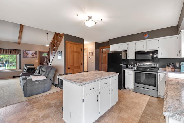 3987 Elaines Way, Slinger, WI 53086 - kitchen with black appliances, open floor plan, a center island, white cabinetry, and beam ceiling