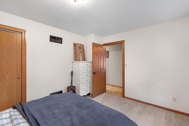 3987 Elaines Way, Slinger, WI 53086 - bedroom with light carpet and baseboards