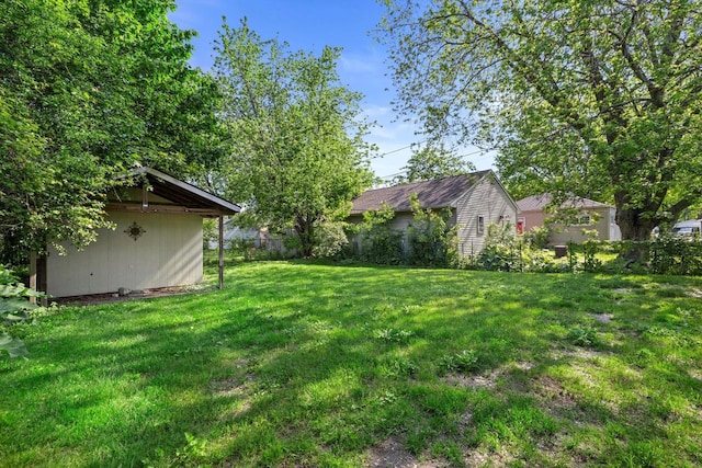 1416 Plainfield Ave, Mount Pleasant, WI 53403 - view of grassy yard featuring an outbuilding