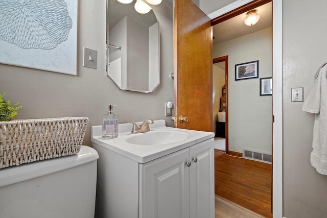 1416 Plainfield Ave, Mount Pleasant, WI 53403 - bathroom with wood finished floors and vanity