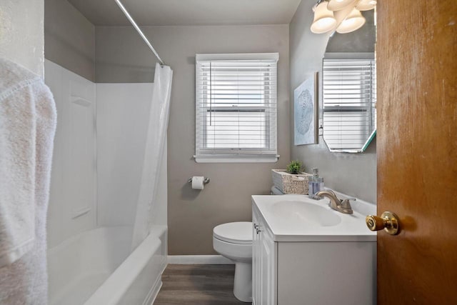 1416 Plainfield Ave, Mount Pleasant, WI 53403 - bathroom featuring wood finished floors, vanity, and shower / bath combo with shower curtain