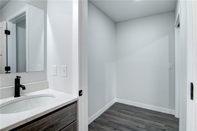 1688 Dorret Rd, Eau Claire, WI 54703 - bathroom featuring vanity and wood finished floors