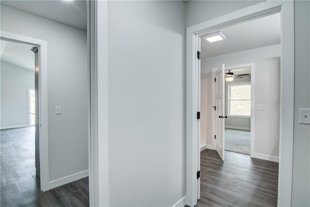 1688 Dorret Rd, Eau Claire, WI 54703 - corridor featuring dark wood-style floors and baseboards