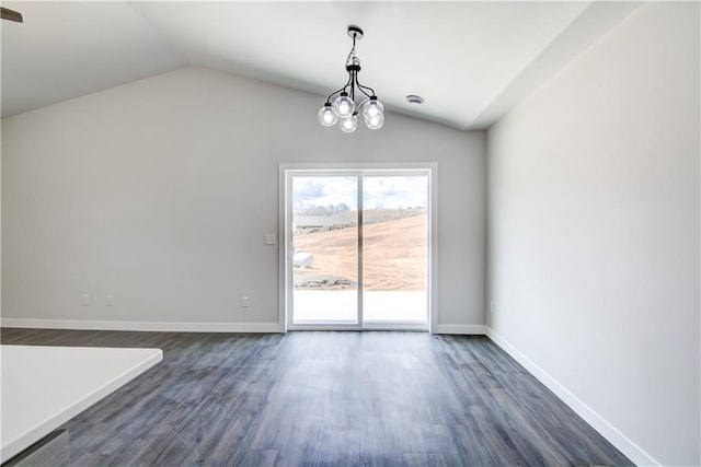 1688 Dorret Rd, Eau Claire, WI 54703 - unfurnished dining area featuring lofted ceiling, dark wood-style floors, and a chandelier