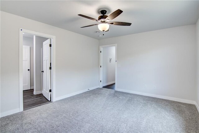 1688 Dorret Rd, Eau Claire, WI 54703 - empty room with dark carpet and a ceiling fan