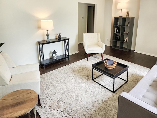 1239 Erick St, Fort Atkinson, WI 53538 - living room featuring wood finished floors and baseboards