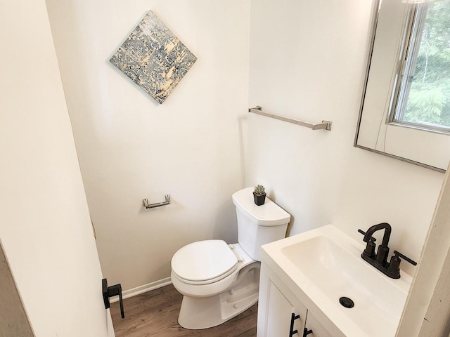 1239 Erick St, Fort Atkinson, WI 53538 - bathroom with wood finished floors and vanity