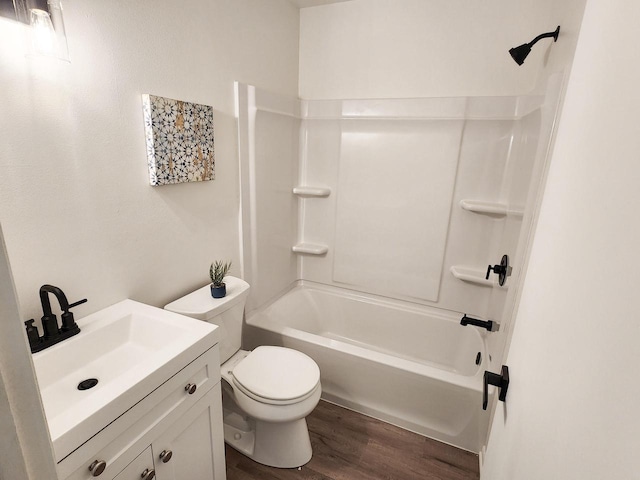 1239 Erick St, Fort Atkinson, WI 53538 - full bath with wood finished floors, vanity, and  shower combination