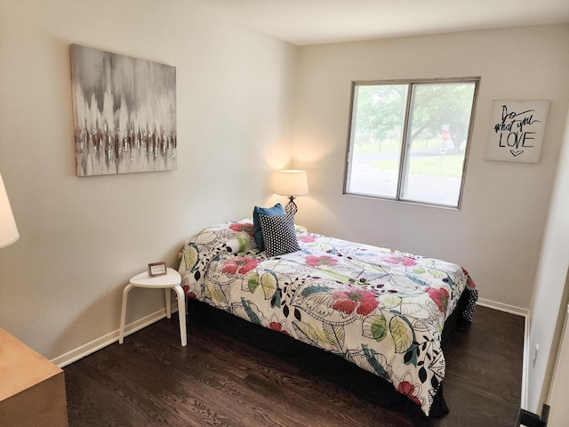 1239 Erick St, Fort Atkinson, WI 53538 - bedroom featuring dark wood finished floors and baseboards
