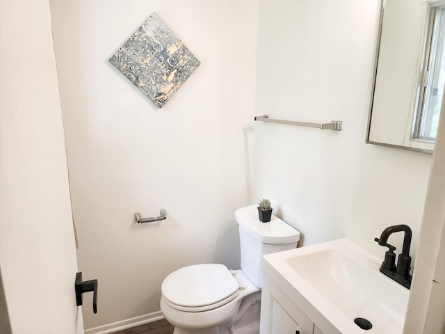 1239 Erick St, Fort Atkinson, WI 53538 - half bathroom with toilet and vanity