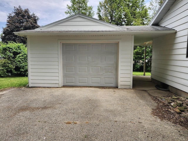 1239 Erick St, Fort Atkinson, WI 53538 - detached garage featuring asphalt driveway