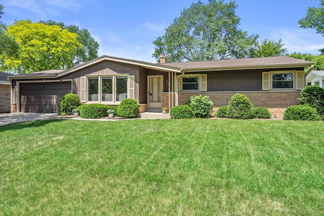 10822 W Derby Ave, Wauwatosa, WI 53225 - single story home featuring brick siding, a garage, a chimney, a front lawn, and concrete driveway