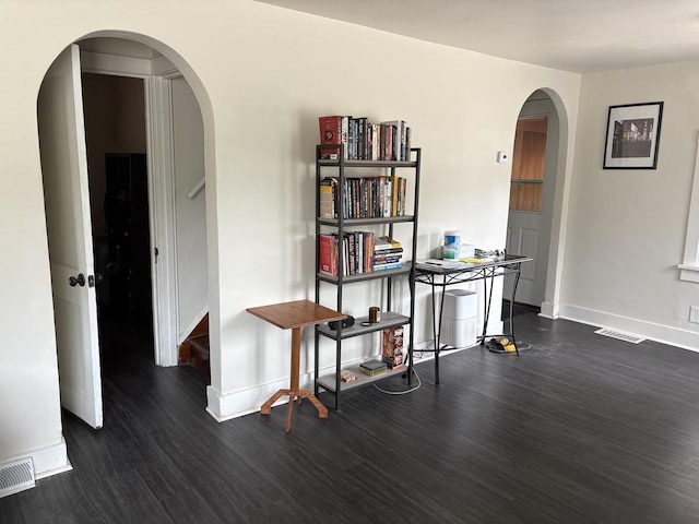 1501 N Summit St, Appleton, WI 54914 - spare room with wood finished floors and arched walkways