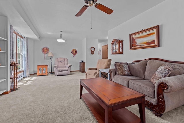 2524 Village Ln Unit B, Oshkosh, WI 54904 - carpeted living room with a ceiling fan and baseboards