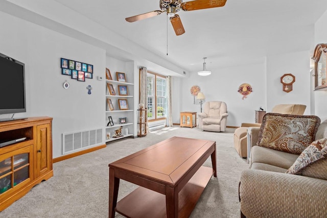 2524 Village Ln Unit B, Oshkosh, WI 54904 - carpeted living room with a ceiling fan and built in features