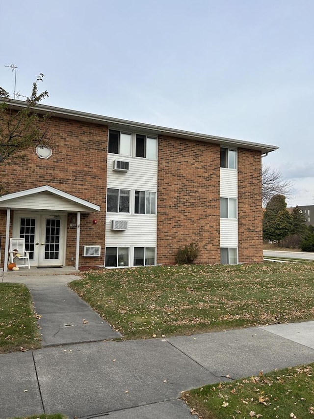 1106 S 7th St, Sheboygan, WI 53081 - view of building exterior with an AC wall unit