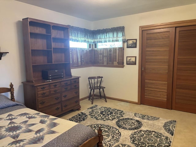 9035 W Burdick Ave, Milwaukee, WI 53227 - bedroom with light colored carpet and a closet